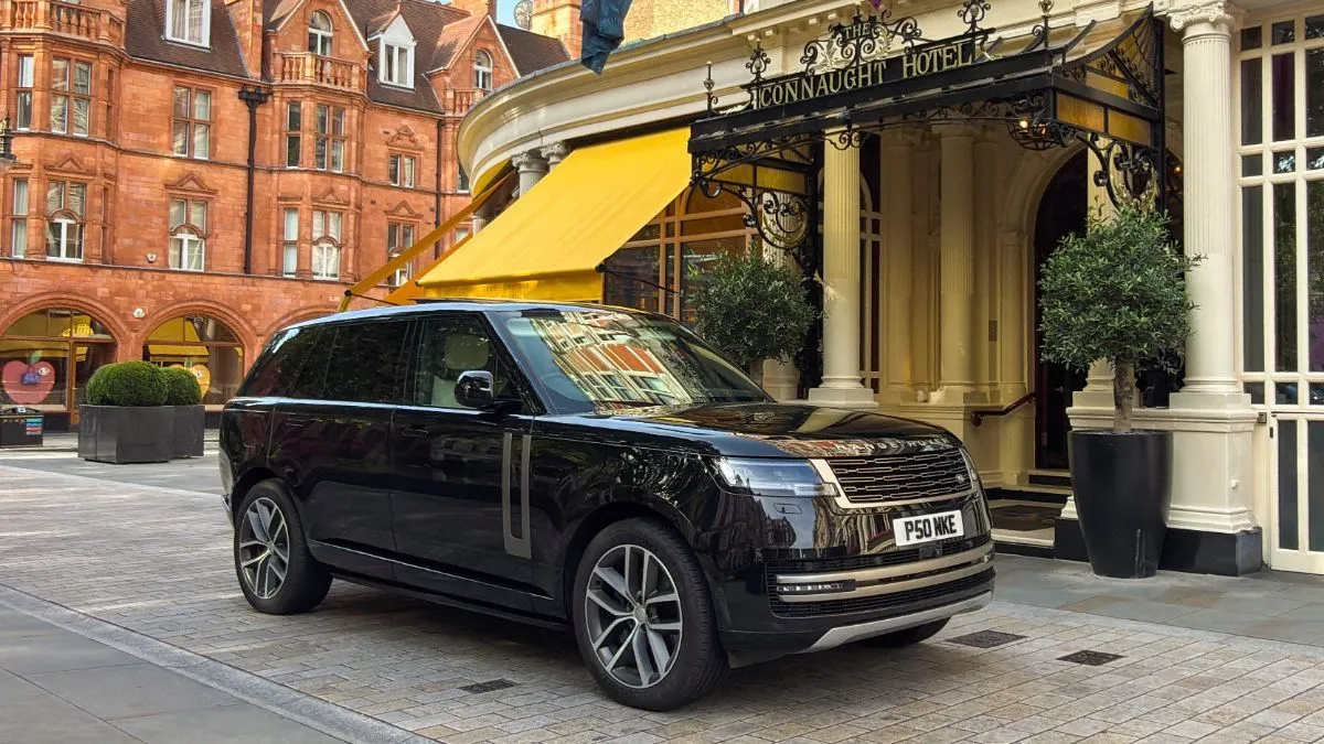 Range Rover chauffeur outside The Connaught Hotel, Mayfair, London